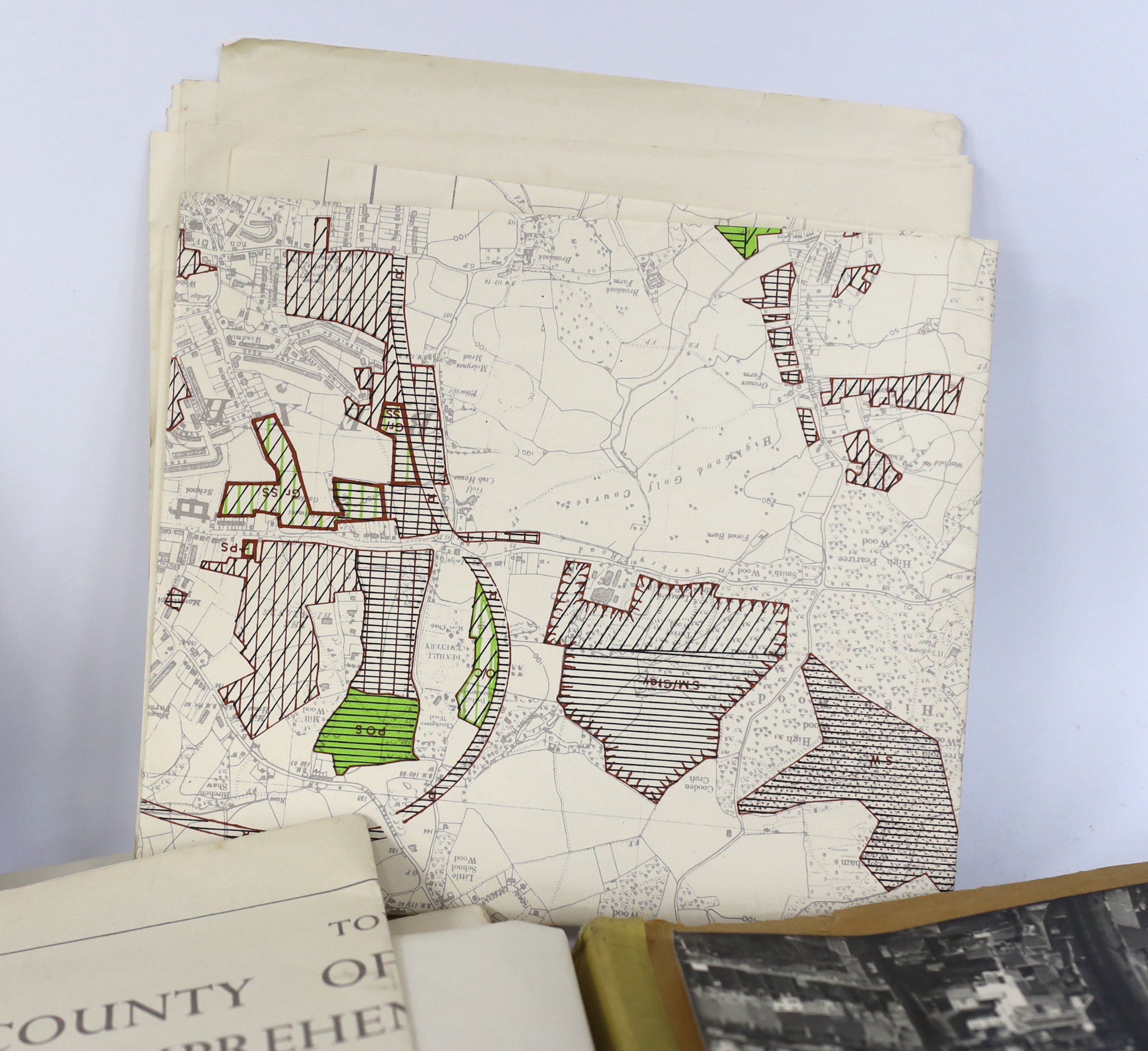 Two black and white aerial views of Lewes, East Sussex, 1986, 23 x 27cms; Crutchley’s New Map of England and Wales, on folding linen in 25 hand-coloured sections, scale 10 miles to an inch, London, 1827, 98 x 60cms; East